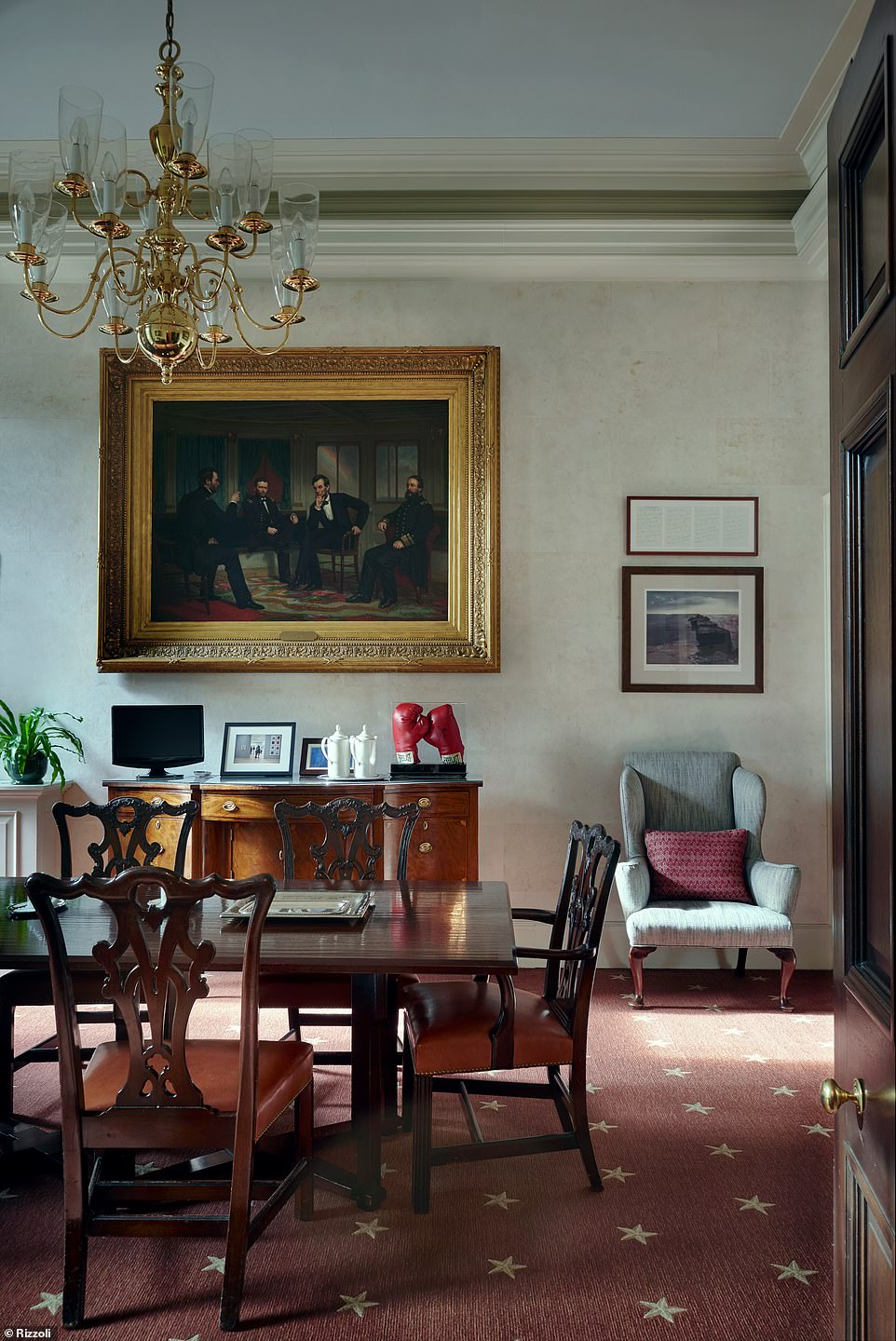 Eat up: In the private dining room (pictured) was an 1868 Civil War painting, a pair of Muhammad Ali’s boxing gloves, and framed notes from a speech by JFK