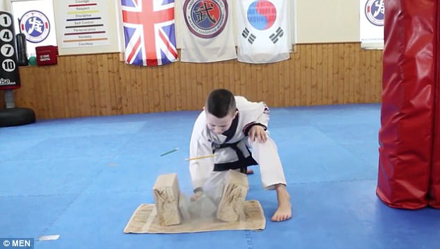 The black belt wizard splits the block with ease in the amazing footage
